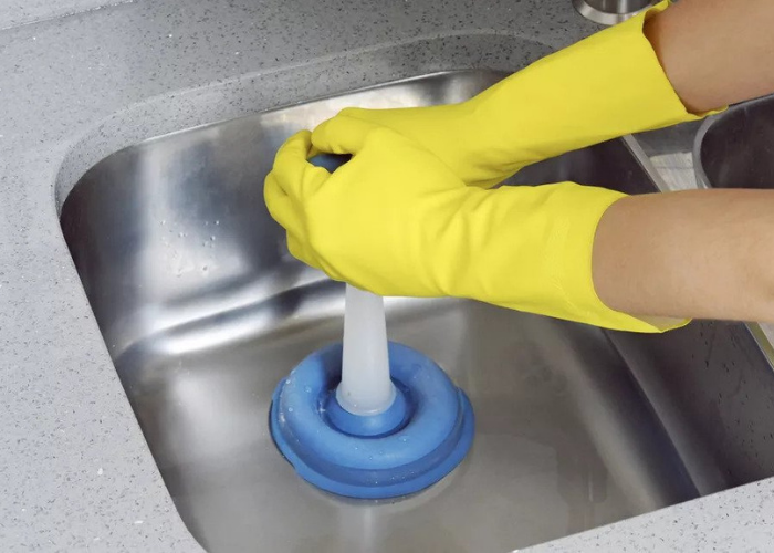 how to unblock drains using plunger