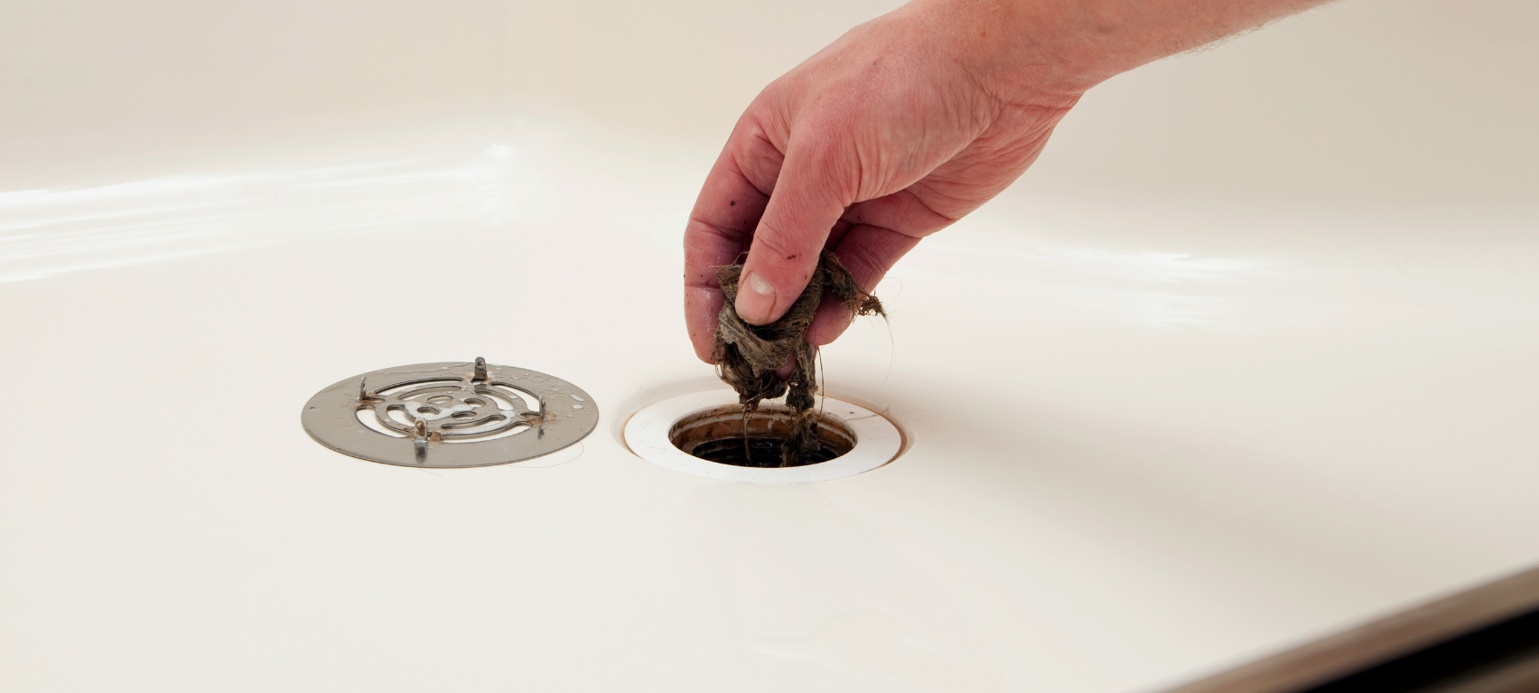 how to unblock bath drain
